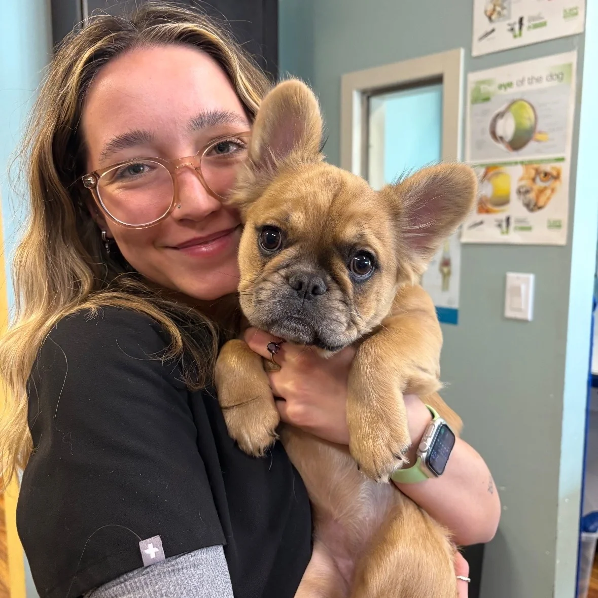 Jessie Holding a Fluffly Frenchie