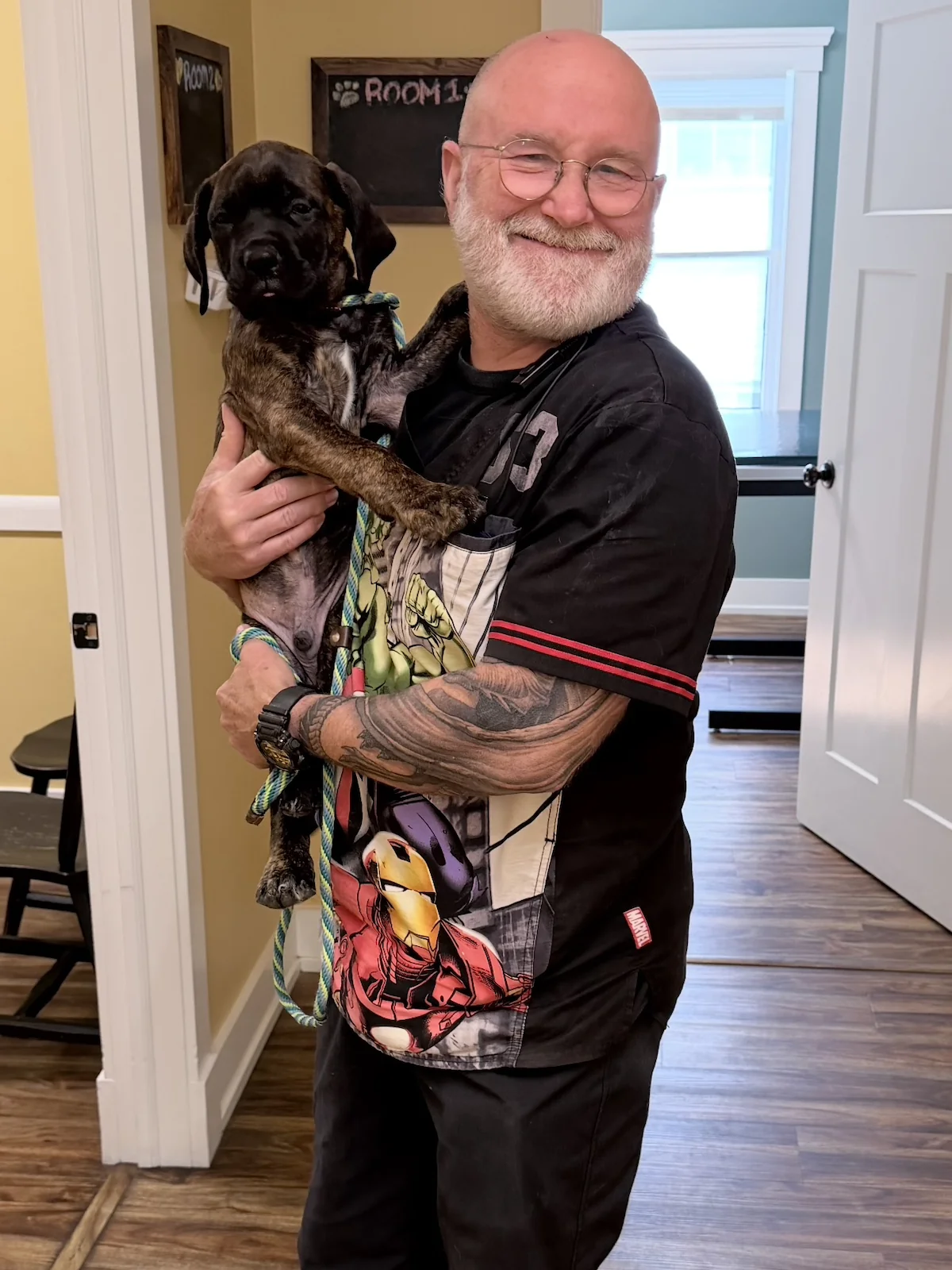 Dr. Templeton Holding a Puppy